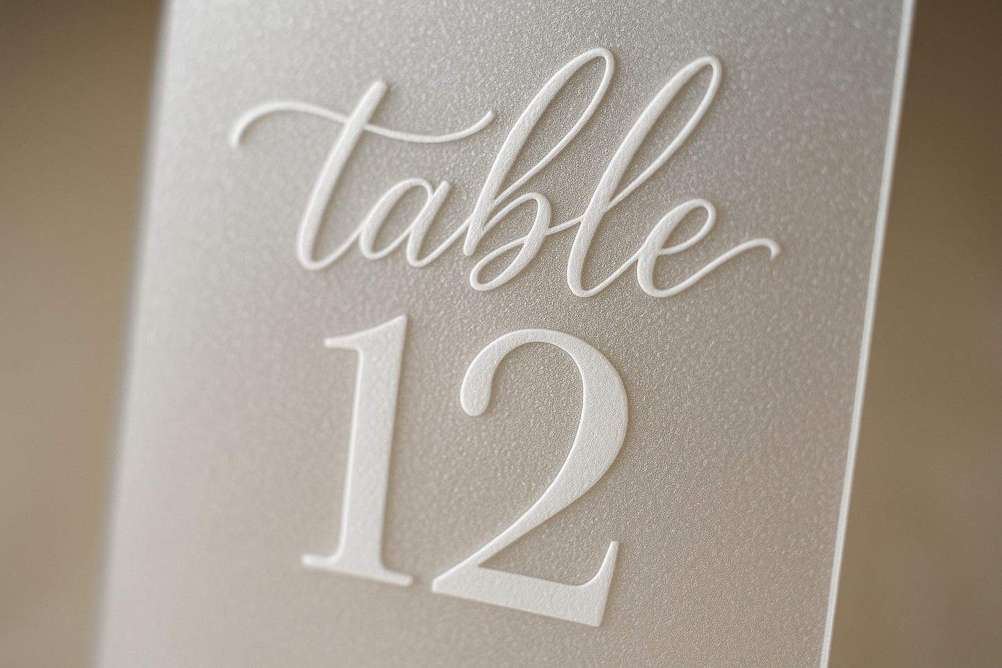 Close-up detail of frosted table number